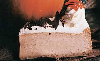 pumpkin cheesecake nestled on a graham crumb base