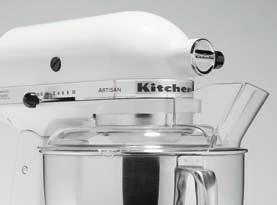 From the front of the mixer, slide the Pouring Shield over the bowl until the shield is centered. The bottom rim of the shield should fit within the bowl. To Remove Pouring Shield 3.
