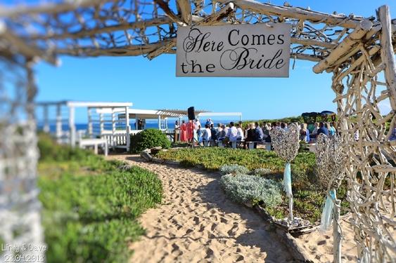 2. OUR UPPER WEDDING DECK-VENUE (Stunning views and with steps to the beach) Permanent Gazebo Bamboo podium Benches or white plastic chairs Sound and music system Register table and 2 chairs R 2 200.