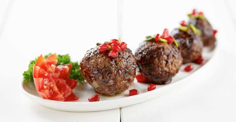 APETTIZER APETTIZER KUFTEH-YE ANAR-O PESTEH 15 Ground minced lamb meat balls drizzled with pomegranate sauce & pistachio.
