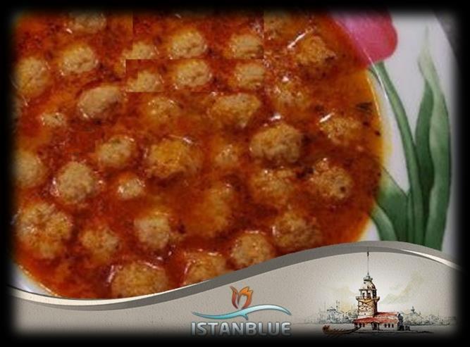 delicious dish from Turkey: tiny beef-stuffed dumplings topped with caramelized tomato sauce, brown
