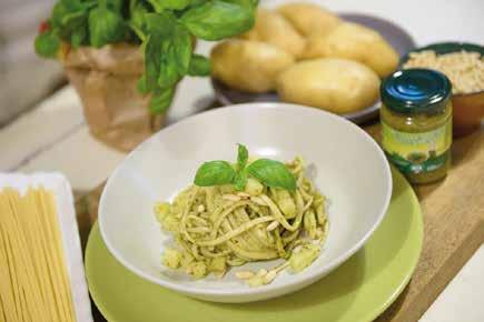 Linguine with pesto and potatoes Spaghetti with olive oil and hot pepper one potato 400 g linguine one jar or tube Green Pesto Basil and pine nuts to garnish Peel and dice one potato, and boil it in