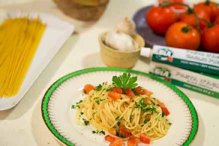 Drain linguine, then dress with pesto and diced potato, mix and serve. Garnish with one basil leave and a few pine-nuts.