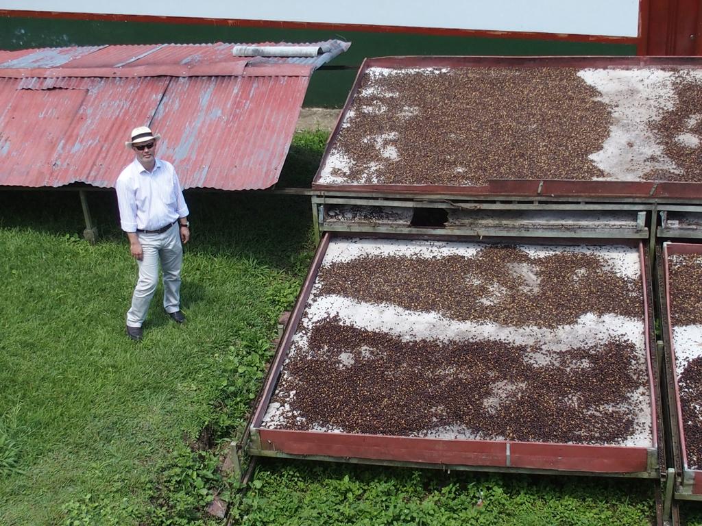 coffee into three or more densities. Light and less dense coffee beans are placed into one section of the table, and dense high- quality coffee beans move to another side of the table.