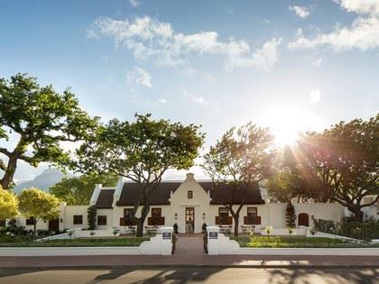 Photo by Charles Russell/Courtesy Leeu Collection HOTEL Leeu Estates A whitewashed Cape Dutch style cellar at Leeu Estates and Spa in Franschhoek is an intimate, romantic setting in which you can