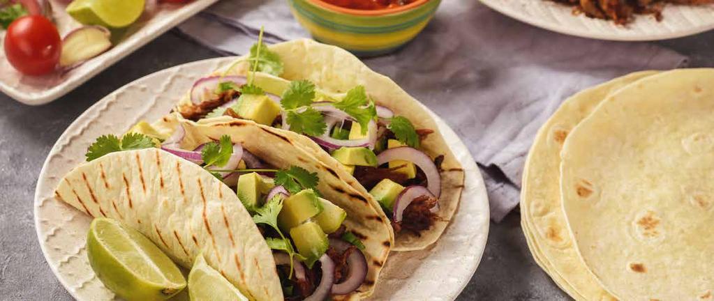 THURSDAY SOFT TACO WITH PICKLED RED ONIONS 1 cup white wine vinegar 1 cup water 2 teaspoons kosher salt 1 red onion, cut in half and sliced very thin into half moons Remaining flank steak from