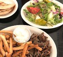 THE MAD GREEK OF CHARLOTTE LUNCH AND DINNER GREEK ENTREES GYRO (LAMB & BEEF) DINNER - CHARLOTTE S FAVORITE $12.95 GRECIAN KEBAB (BEEF AND PORK) DINNER $12.