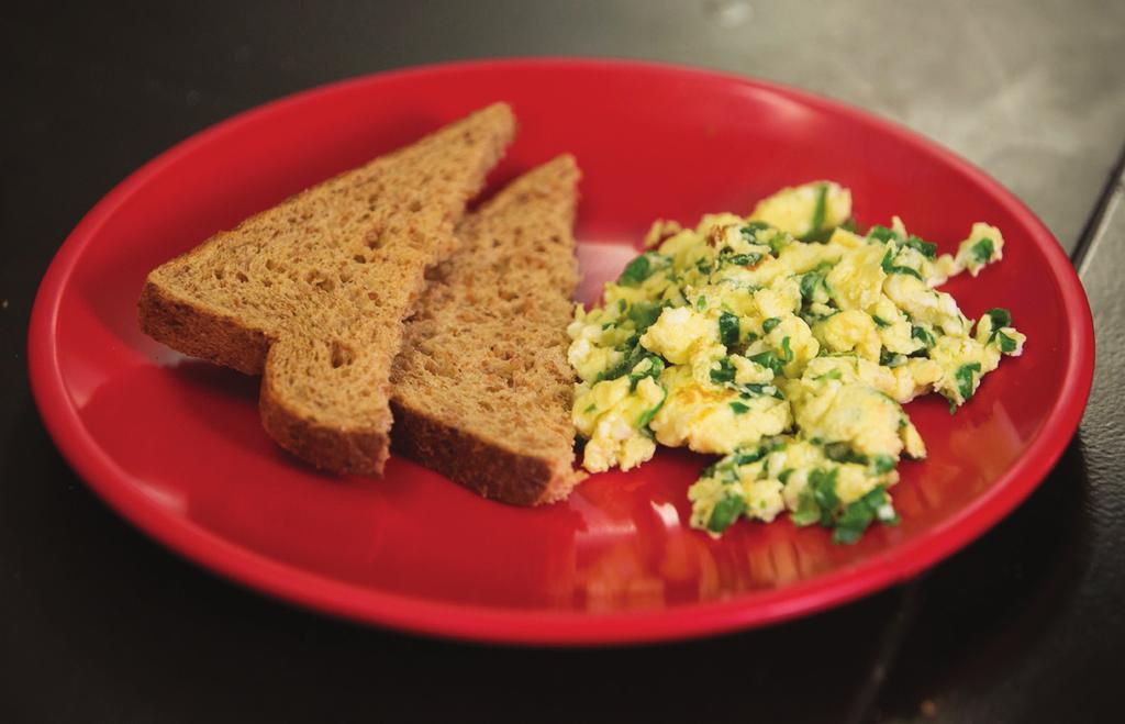 Dear Family, Today, your child made scrambled eggs with spinach as part of a cooking activity. He or she learned how to include vegetables in egg dishes and practiced many basic cooking skills.