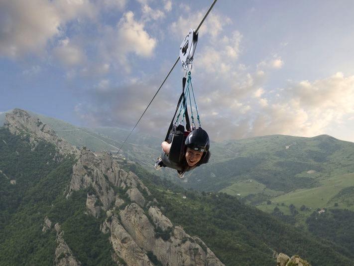Feel an adrenaline rush unlike any other as you travel at speeds of up to 120 km/h and heights of up to 1020 m suspended on a wire between the