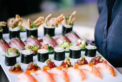 Roast Beef with Watercress And Spicy Horseradish Sauce Chicken, Beef and Seafood Sate s A Variety of Sushi with Wasabi Sauce and