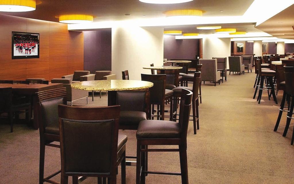 private lounge - Convertible lounge for meeting space - Catering by Levy Restaurants - Full-service bar with bartender and suite attendants - 8 LCD televisions with satellite and in-house video