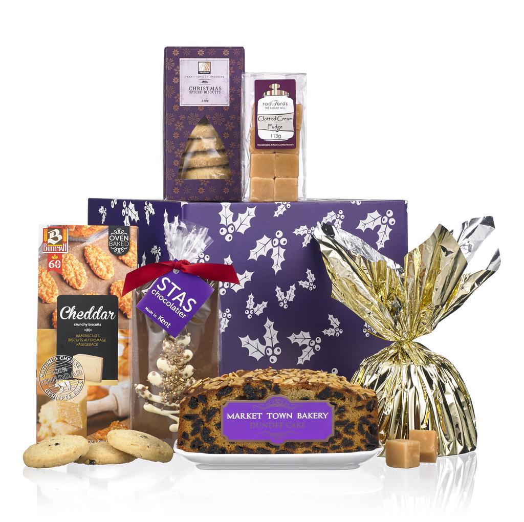 GOODIES GALORE Presented in a purple festive carton containing: Abbey Biscuits 150g Buiteman English Cheddar Biscuits 75g Market Town Bakery Rich Dundee Slab Cake Matthew Walker Christmas Pudding