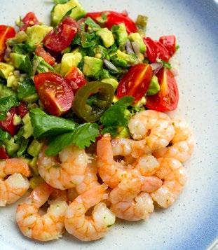 Garlic Prawns With Avocado Tomato Salad > > Prawns: Whether you shop at a local fishmonger or a larger supermarket, you can usually find precooked prawns/shrimp in the fish and seafood sections.