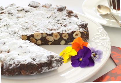 12 45 Panforte Panforte is an Italian classic. A rich fruit and nut cake that makes the perfect accompaniment to coffee or served as a decadent dessert.