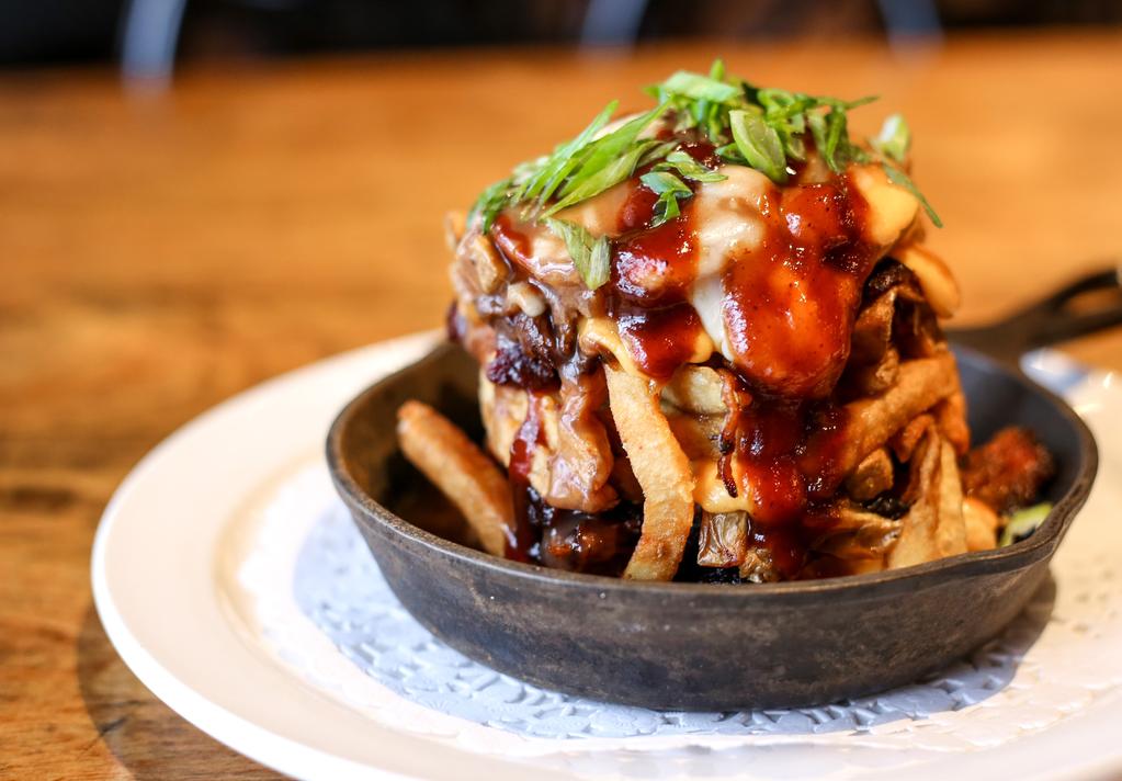 Maple Pecan Salmon Poutine Stacks PULLED PORK POUTINE 40 creek BBQ pulled pork, layered with Pine River Cheese curds and fries.
