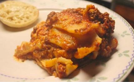 Crockpot Lasagna 2 pounds sausage or ground beef (browned) 2 cans (26.