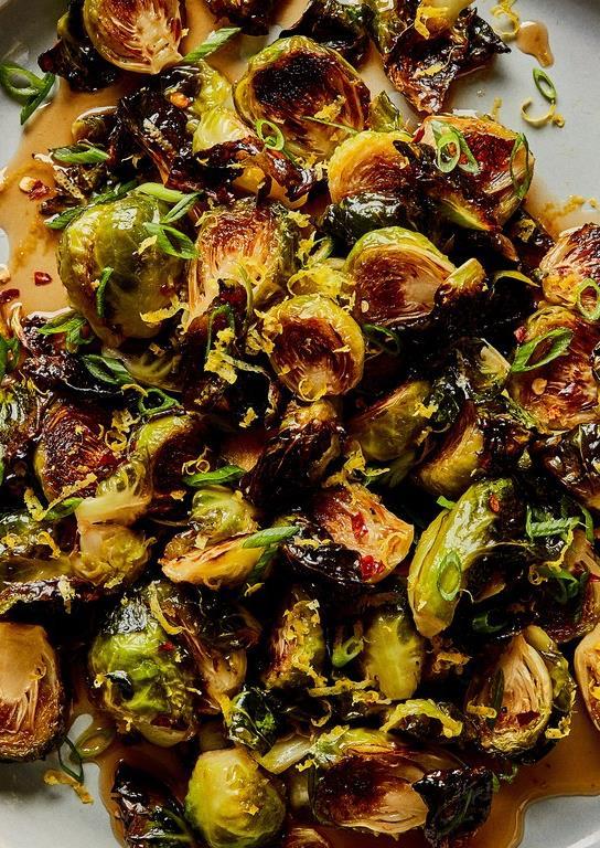 ROASTED BRUSSELS SPROUTS WITH WARM HONEY GLAZE 1½ lb. brussels sprouts, trimmed, halved ¼ cup extra-virgin olive oil ½ tsp.