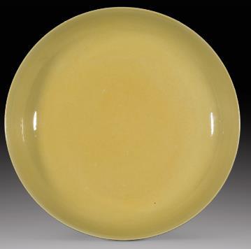 8. Dish Porcelain with translucent glaze and pale yellow enamel Ming dynasty, Hongzhi