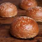 SLIDER BRIOCHE BUN 20G A French-style mini burger bun enriched with butter and milk, topped with sesame seeds.