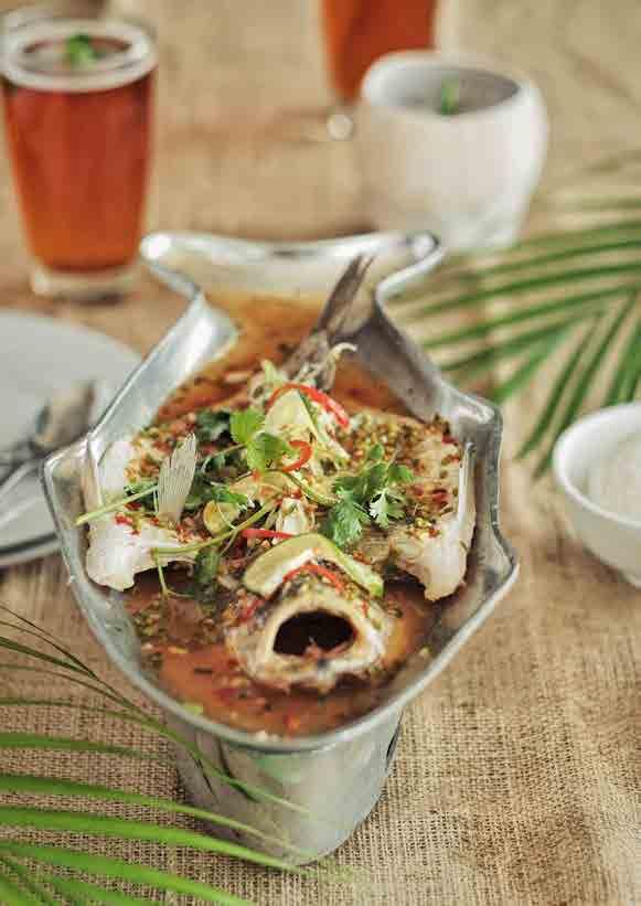 pla samun pai crispy thai herb fish 160 batter fried fish topped with thai herbs and tamarind sauce that gives its spicy, sweet and sour flavo ur.