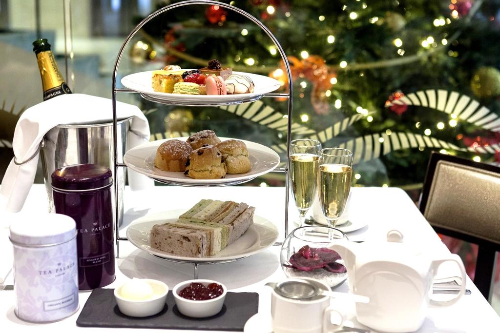 FESTIVE AFTERNOON TEA Served with mulled wine Sandwiches Roasted turkey & cranberry on walnut bread cucumber, Crème fraiche & mint on basil bread, Free range egg & mustard mayonnaise on white bread,