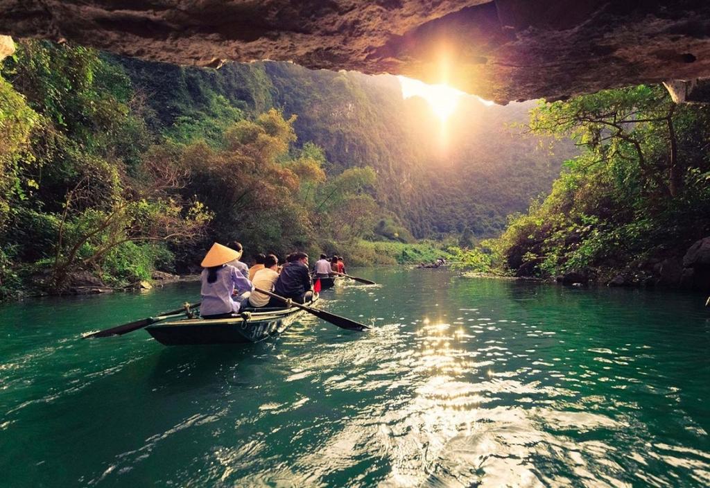 Day 4 -Ninhbinh- boat trip to galaxy grotto -After breakfast, you will head to NinhBinh then join a countryside leisure excursion ride on bicycles (or you can take the ride alternatively if you are