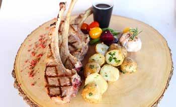 on a wooden plate 76 77 78 RACK OF LAMB 895 B Grilled Australian rack of lamb 300g, herb