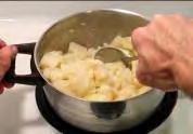 ...mash the potatoes using either a potato masher