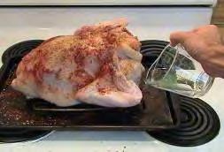 Leave the turkey breast side DOWN on the roasting rack and let it sit