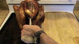 Remove the turkey from the oven and check it for