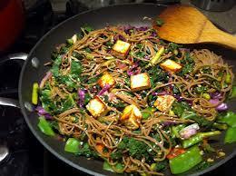 Steaming or stir-frying vegetables instead of boiling vegetables falls under what classification of water conservation?