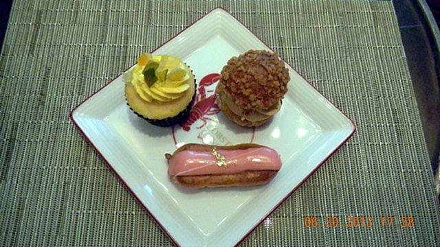 0 0 Sun, Jun 30, 2013 47 Cupcake Lemon & Fruit Confit + Paris Brest + Raspberry Eclair in Chinese From the Dessert Buffet Table - Part of Sodashi tea set.