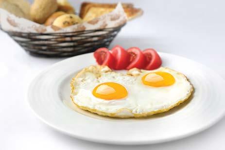 EGGS TO ORDER SUNNY SIDE UP (D) Two fried eggs 31 (D ) PLAIN OMELET (D) SPANISH OMELET (D) Two eggs cooked with chopped onions, colored capsicum and tomatoes SCRAMBLED EGGS (D) Two eggs cooked with