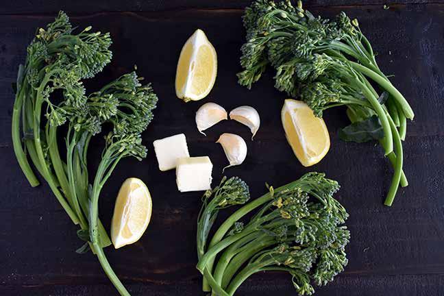 TUESDAY ROASTED BROCCOLINI WITH LEMON, RED PEPPER FLAKES AND PARMESAN 2 heads broccolini 2 tablespoons extra virgin olive oil 1 head garlic ¼ teaspoon kosher salt Freshly cracked black pepper to