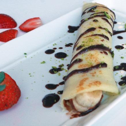 CREPE With Spinach and Cheddar Cheese 32.00 With Banana and Choice of Dark Chocolate, Strawberry Sauce, Nutella or Honey 40.