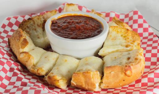 Italian Fondue $4.00 A house favorite! Our famous garlic bread topped with melted provolone cheese, cut into bite sized pieces and served with our original sauce for dipping.