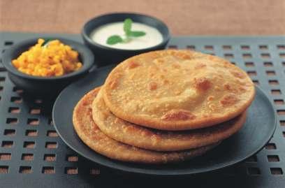 Dal Paratha oday's home-maker takes pride in presenting a variety of dishes to her Tfamily.