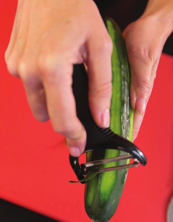 Rinse the cucumber, tomato, and apple under cold, running tap water. (Optional) Scrub the peel gently with a clean vegetable brush while rinsing the produce.