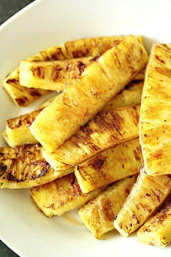 GRILLED CARAMELIZED PINEAPPLE S I D E D I S H Serves: 8 Prep Time: 30 Minutes Cook Time: 15 Minutes 1 pineapple (cut into large wedges or chunks) 1/4 cup brown sugar 1/4 cup butter (melted) 1/2