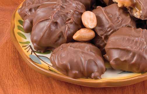peanuts submerged in fresh caramel and