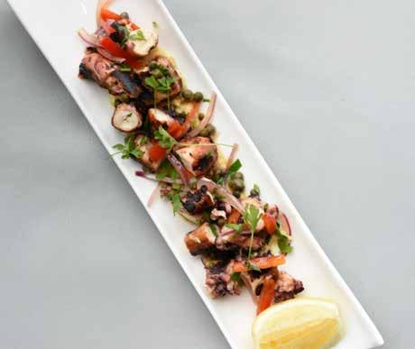CONTEMPORARY MEDITERRANEAN CUISINE WITH A STRONG GREEK INFLUENCE In 2012, the Atlas Restaurant Group opened Ouzo Bay in Baltimore s posh