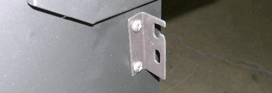 Position brackets on side of cart with attach angles inward and open slot upward