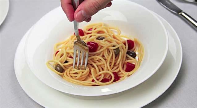 EATING PASTA Get strands of pasta and twirl it on plate.