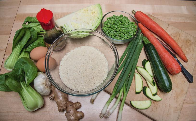 Chinese-American Fried Rice with Sweet and Sour Cucumbers SERVES 6 2 cups water 1 cup jasmine or long-grain white rice ½ teaspoon salt 1 garlic clove 1 small piece of ginger (about 1 inch) 1 carrot 1