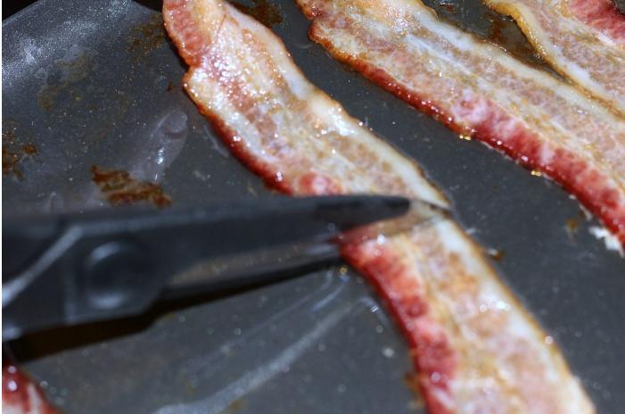 Cut bacon into chunks that will fit in the egg cups dish.