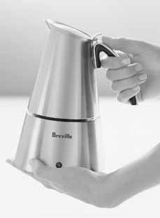 Unscrew the carafe from the boiler, then lift the coffee basket out of the top of the boiler. Fill the carafe with fresh water up to, but not above the MAX mark inside the carafe (300ml).
