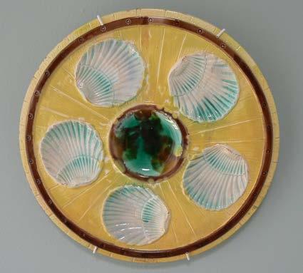 102 Yellow ceramic oyster plate. 195.00 No.