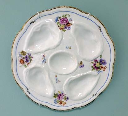 No. 25 A rare floral decorated oyster plate.