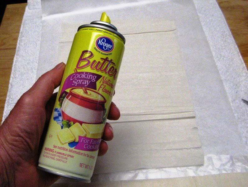 Unroll a sheet of the Fillo Dough on the wax paper.