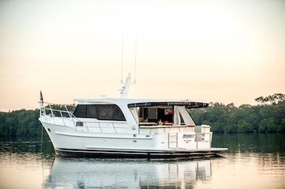 Specifications 48 foot Cruiser Accommodates up to 12 passengers Lounge area on rear deck with dining table Lounge and dining on inside Reverse Cycle air